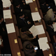 Representatives on their phones at Shenzhen’s People’s Conference in 2013.